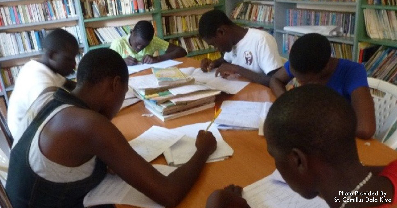 Older students study in the library.