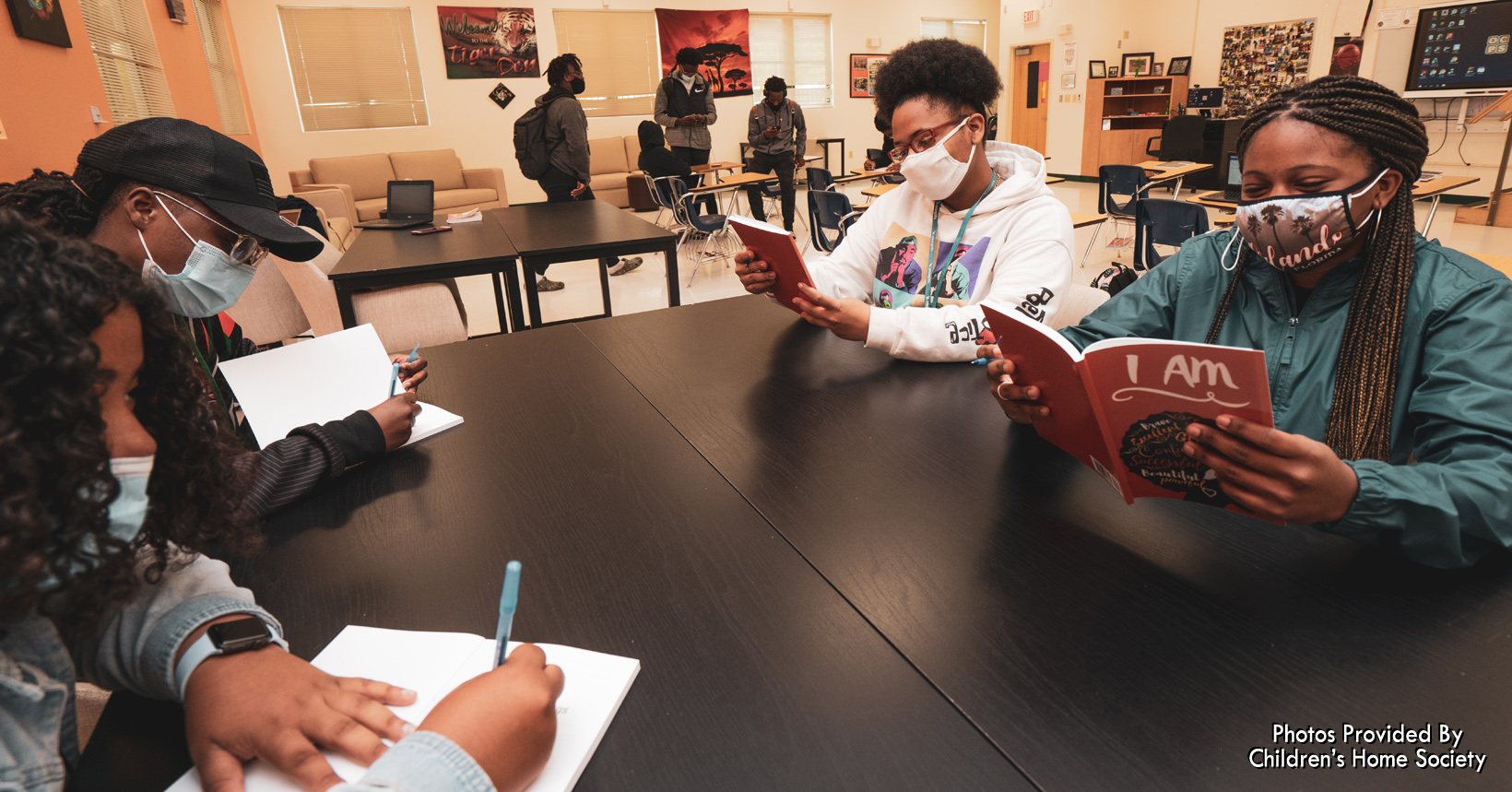 Small mindfulness (mental health) session – students are completing a "Mind Your Mind Girl" journaling exercise at Jones High, a Community Partnership School.