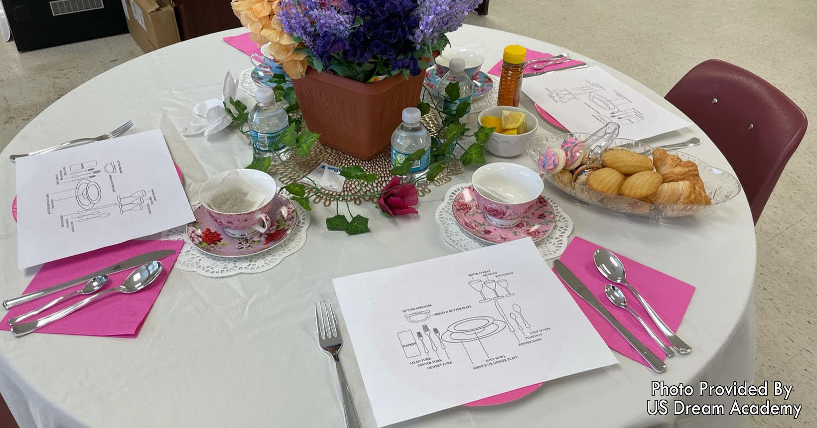 A table set with place setting instructions to help children learn table etiquette.