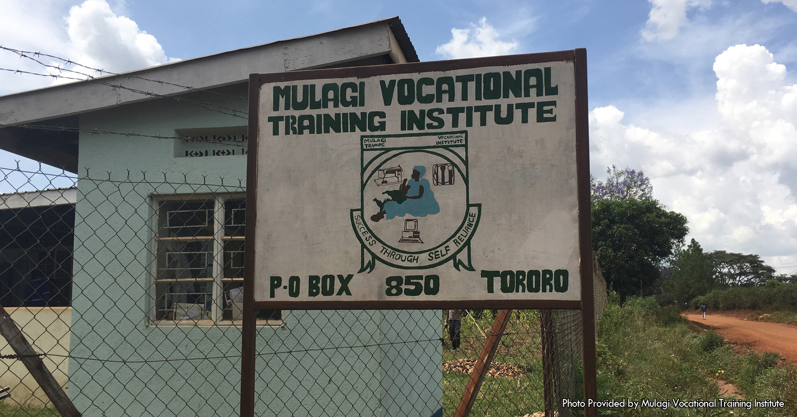 Gate and sign for the Mulagi Vocational Training Institute, Tororo, Uganda.