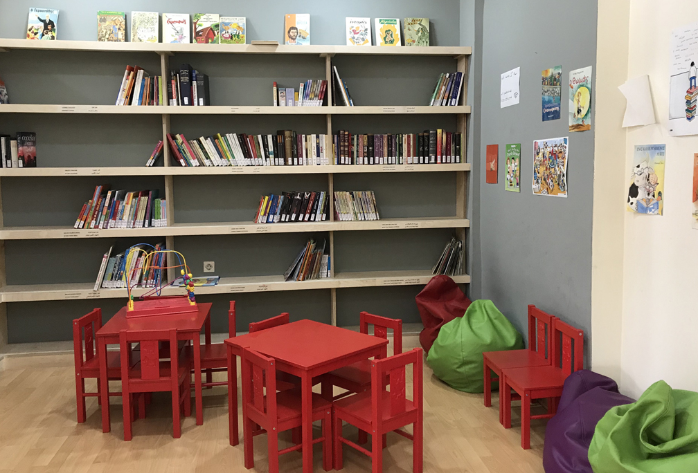 One of the hubs in Athens has a stocked library and reading area for adults and children alike. The library offers popular books in Arabic, as well as in Greek and English to help children assimilate to their new country.