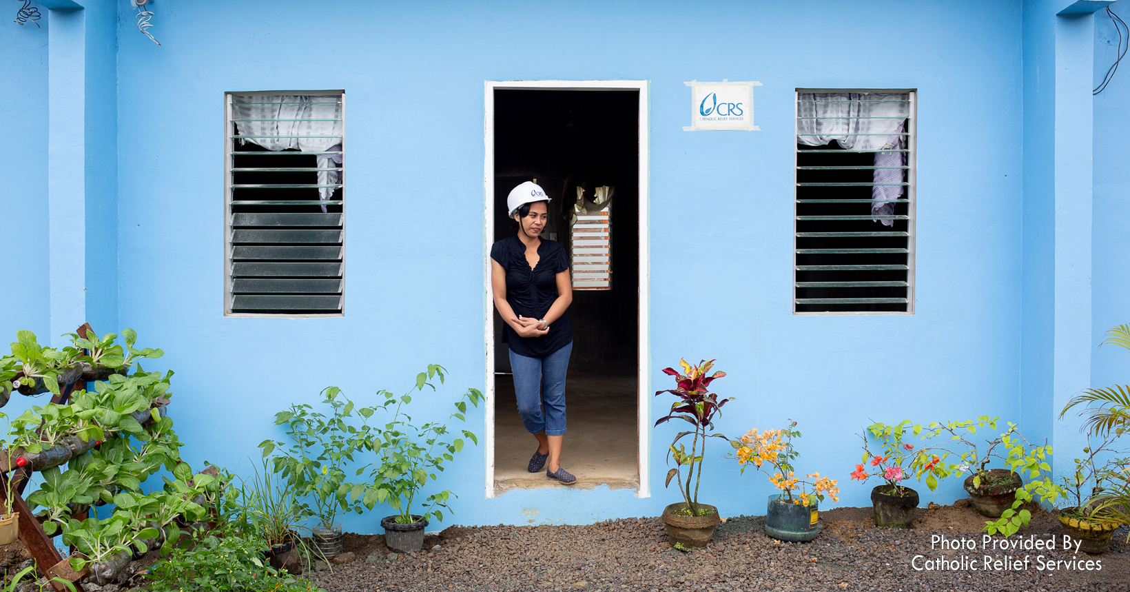 Girlita Ascalona is seeing her new home for the first time. The house is resilient towards earthquakes, rainwater, and typhoons. Her home has an indoor toilet, full electrical wiring and can hold a second story if she wants to build one.