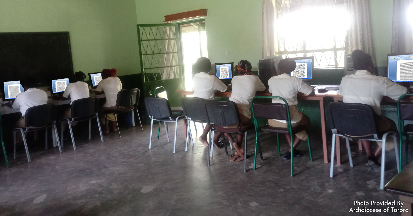 A computer lesson is held for the girls who are secretarial students.