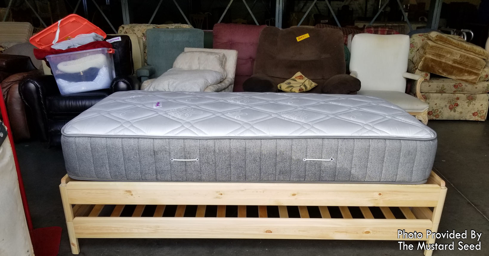 Stackable bed with mattress.